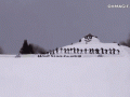 amazing-30-skiers-chain-backflip